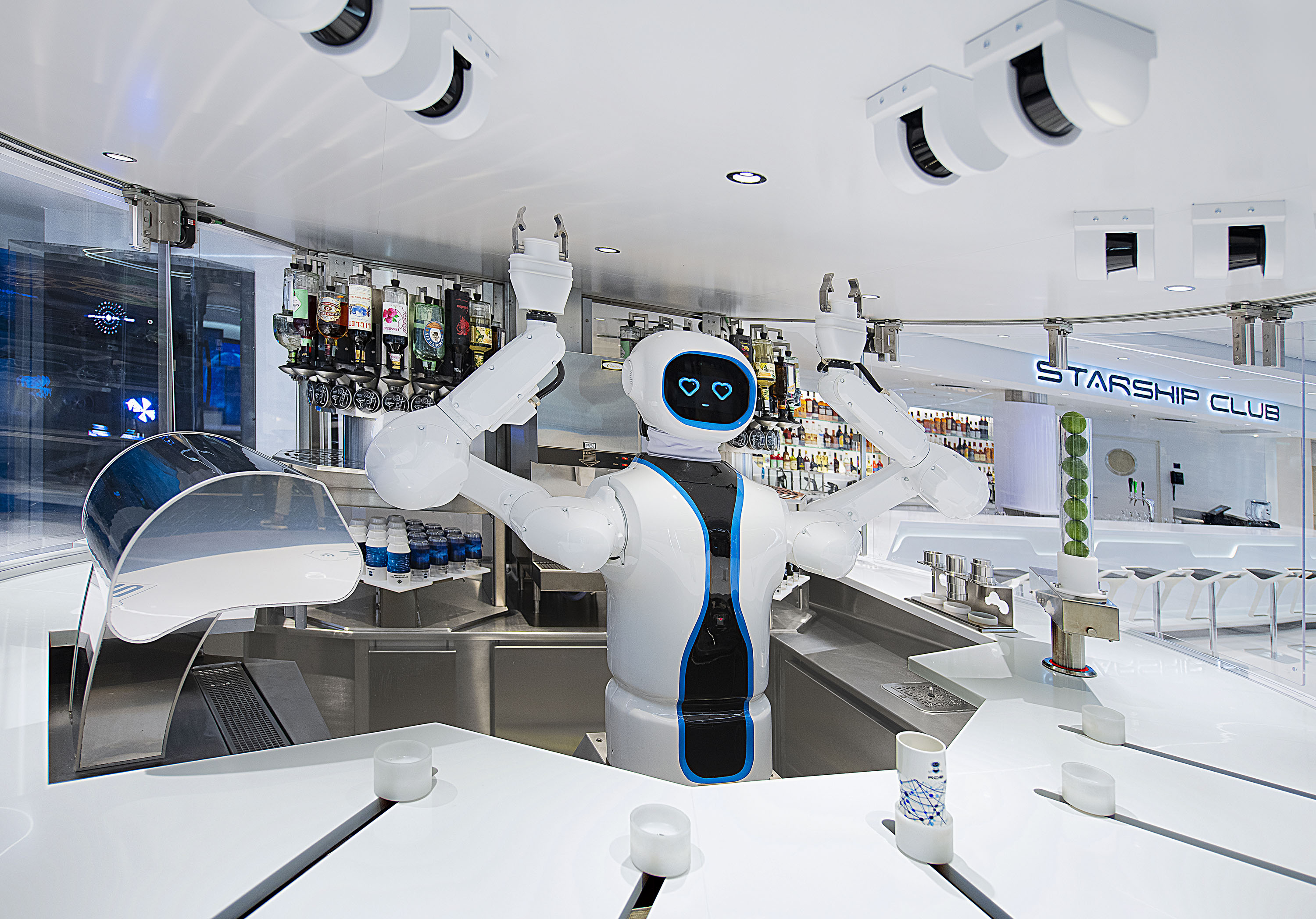 Enjoy five outdoor bars and 16 indoor bars, including the first humanoid Robotic bartender at sea!