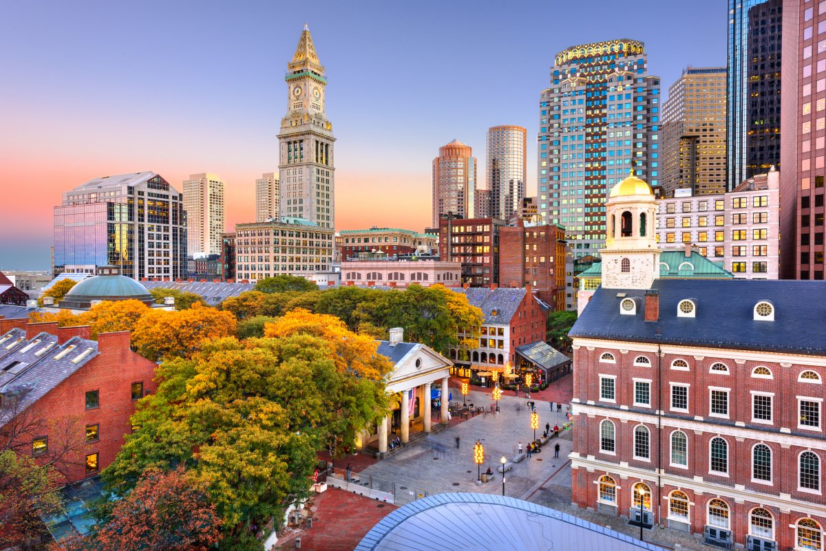Boston, Massachusetts skyline with Faneuil Hall and Quincy Market at dusk