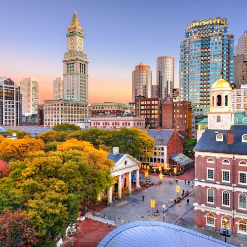 Boston, Massachusetts skyline with Faneuil Hall and Quincy Market at dusk
