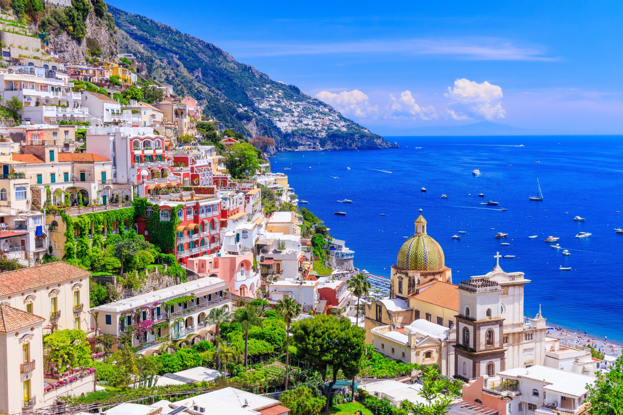 View of Positano town and the seaside at sunset