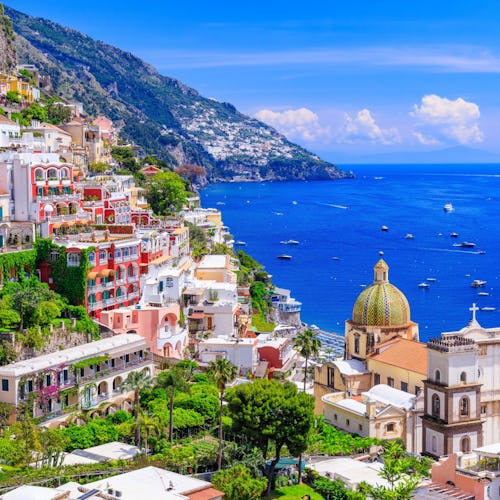 View of Positano town and the seaside at sunset