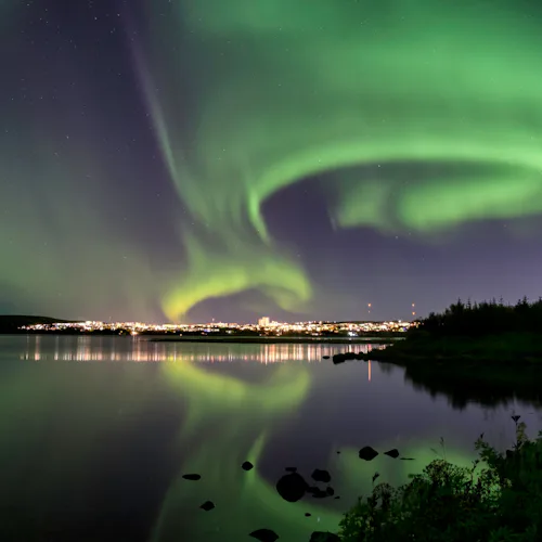 Northern Lights over Reykjavik city