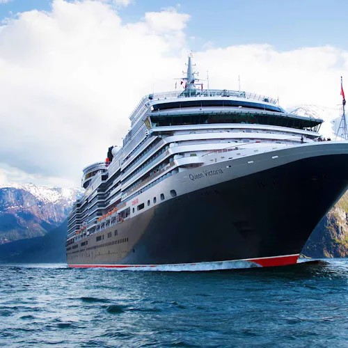 Cunard's Queen Victoria sailing through the Norwegian Fjords