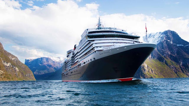 Cunard's Queen Victoria sailing through the Norwegian Fjords
