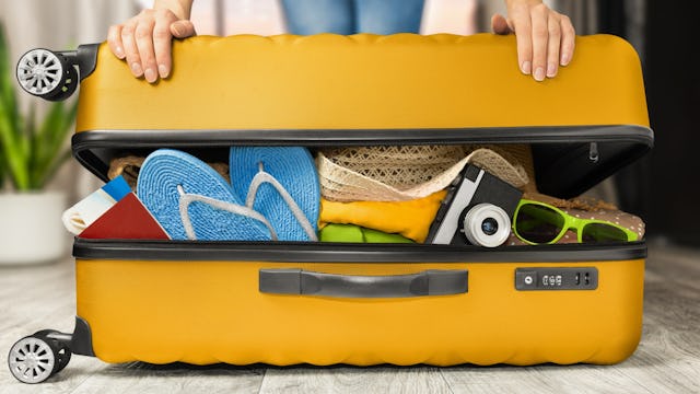 Packing a suitcase for a world cruise