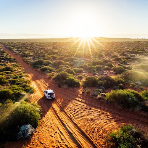 Driving off-road in Western Australia at sunset