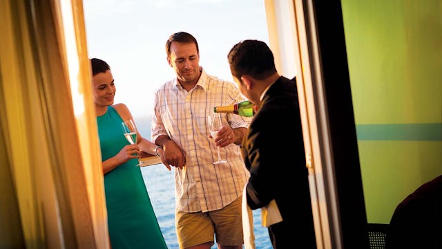 NCL Butler Serving Champagne