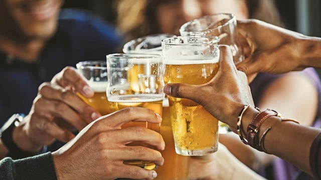 People enjoying a pint on board