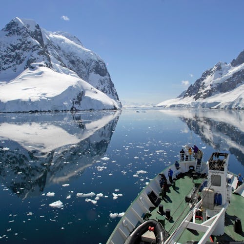 A cruise ship makes passage through the Lemaire Channel in Antarctica