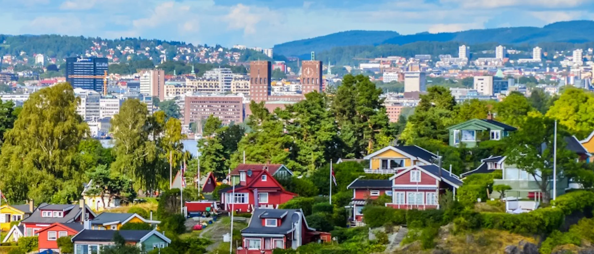 View of Oslo between city and typical nordic cottages