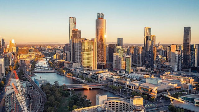 Panorama of downtown Melbourne from high point. Australia. Drone photo of skyscrapers before sunset