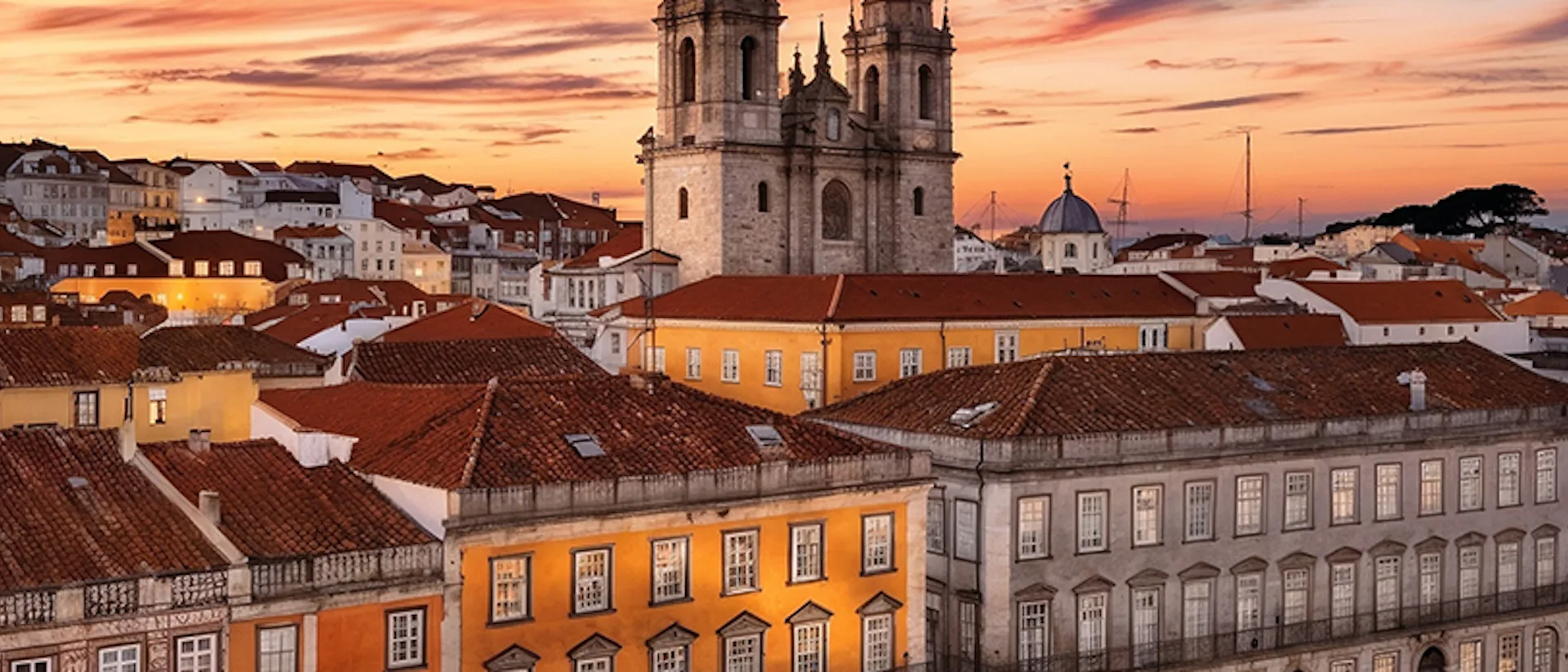 Sunset Over Lisbon: A Captivating View of Historic Architecture