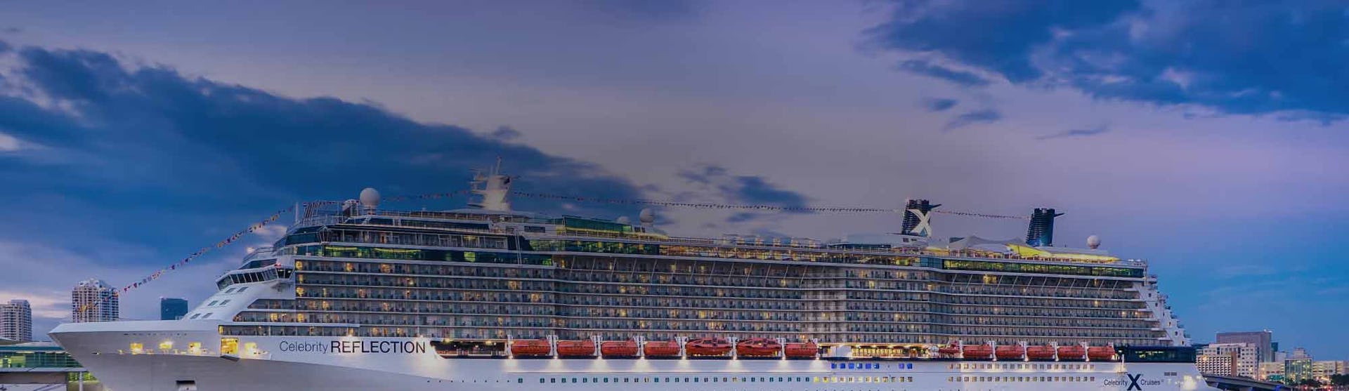 Celebrity Reflection cruise ship docked at dusk