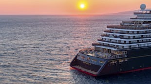 Stern end of Explora II at sunset