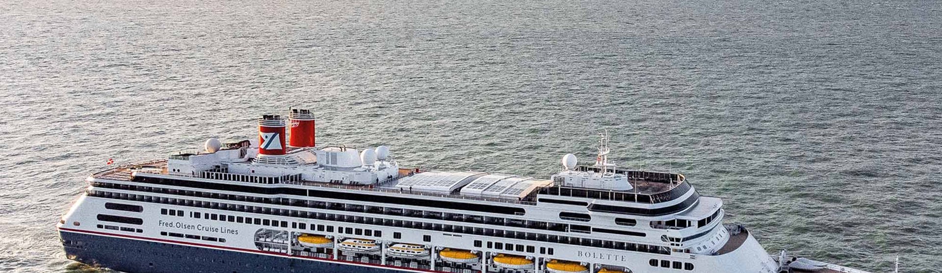 Bolette cruise ship with shore in the background