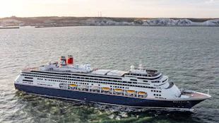 Bolette cruise ship with shore in the background
