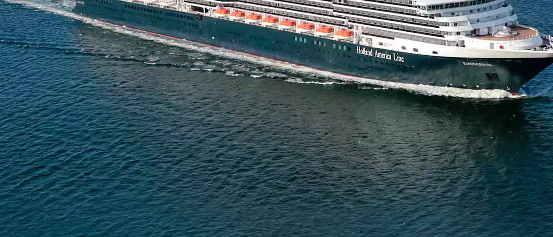 Holland America Koningsdam sailing into view