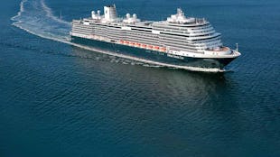 Holland America Koningsdam sailing into view