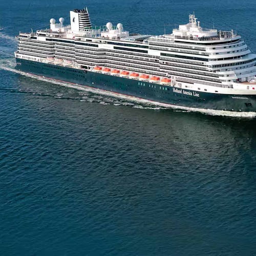 Holland America Koningsdam sailing into view