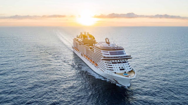 MSC Virtuosa sailing in the sunset