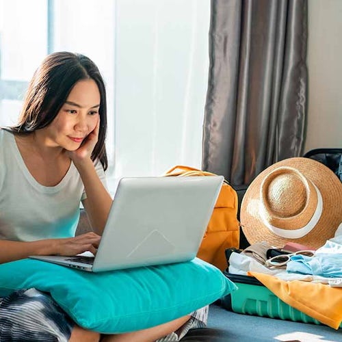 Woman effortlessly booking cruise holiday online