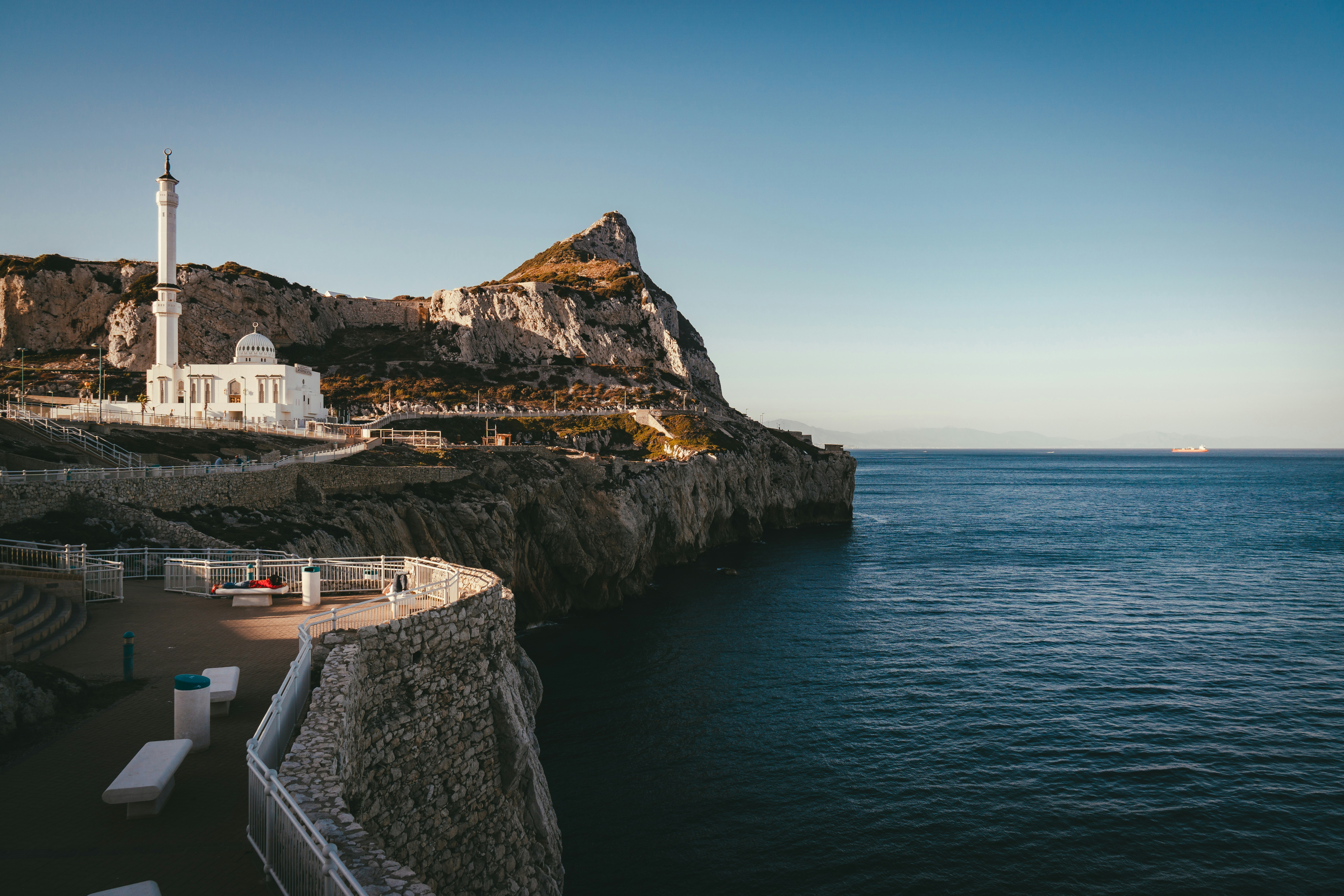 lighthouse at the edge of a cliff