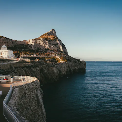 lighthouse at the edge of a cliff